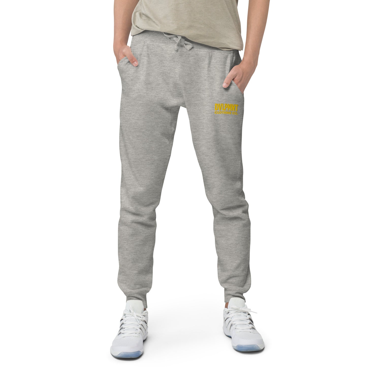 Black DVLPMNT CLOTHING CO. unisex fleece sweatpants, cozy and relaxed fit, shown in a casual setting.