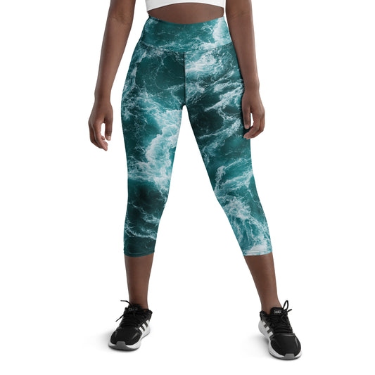 DVLPMNT CO. Cobo Storm yoga capri leggings, cut-sew style, lightweight fabric, close-up of navy blue leggings with subtle pattern