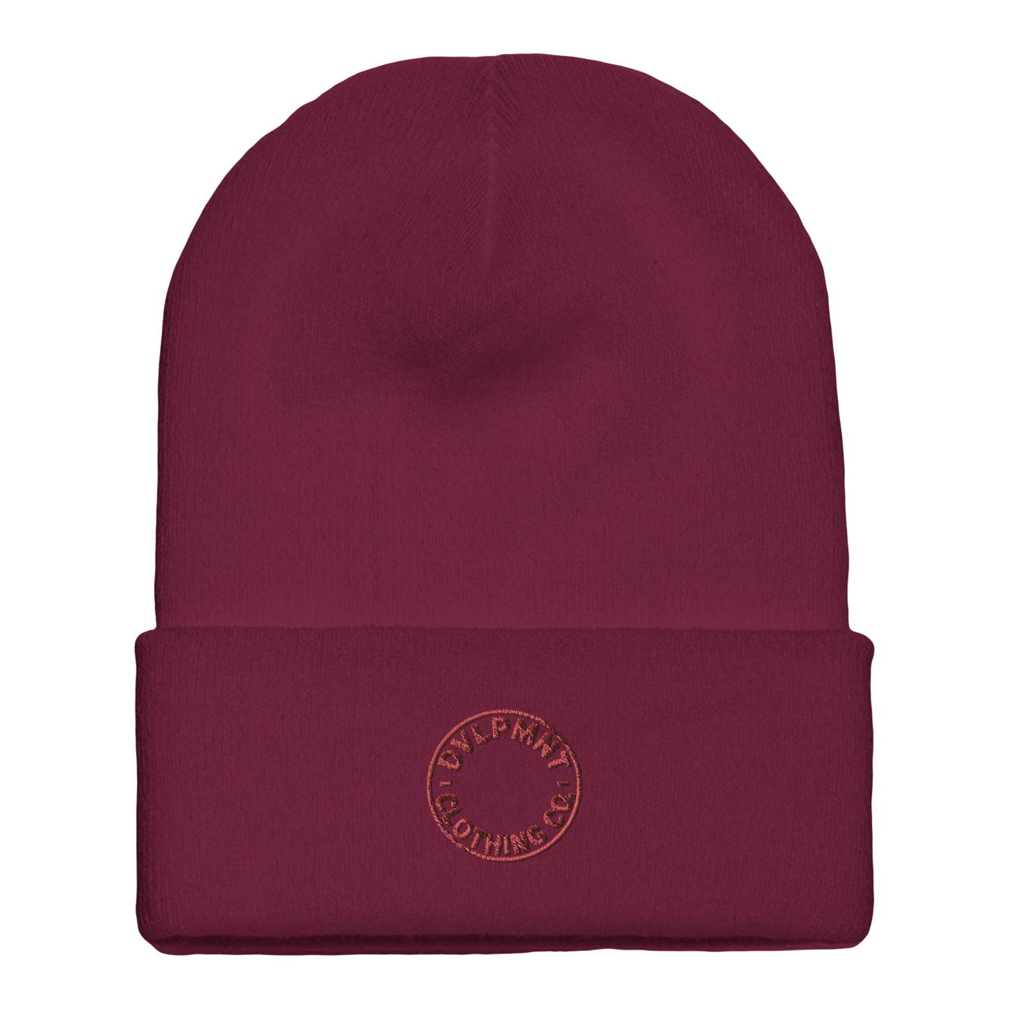 DVLPMNT CLOTHING CO. cuffed beanie made of print material with gold accents, featuring a snug fit and stylish design.