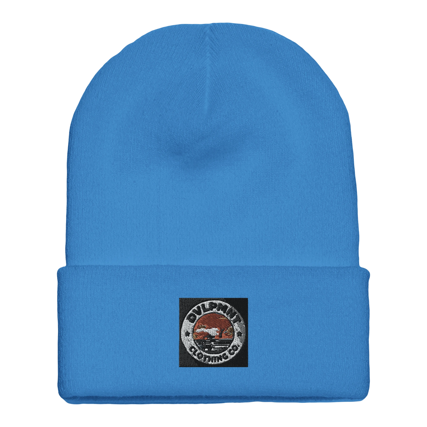 DVLPMNT CLOTHING CO. cuffed beanie made of print material with gold accents, stylish and cozy winter accessory.